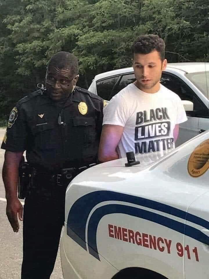 Black Cop Arresting White Male at Black Lives Matter Rally